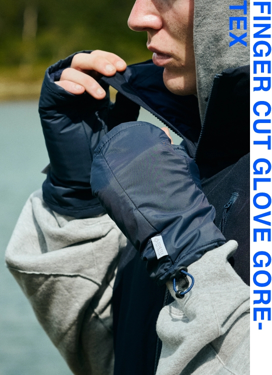 ダイワプロのゴアテックスフィンガーカットグローブを着用している男性の手元のアップ